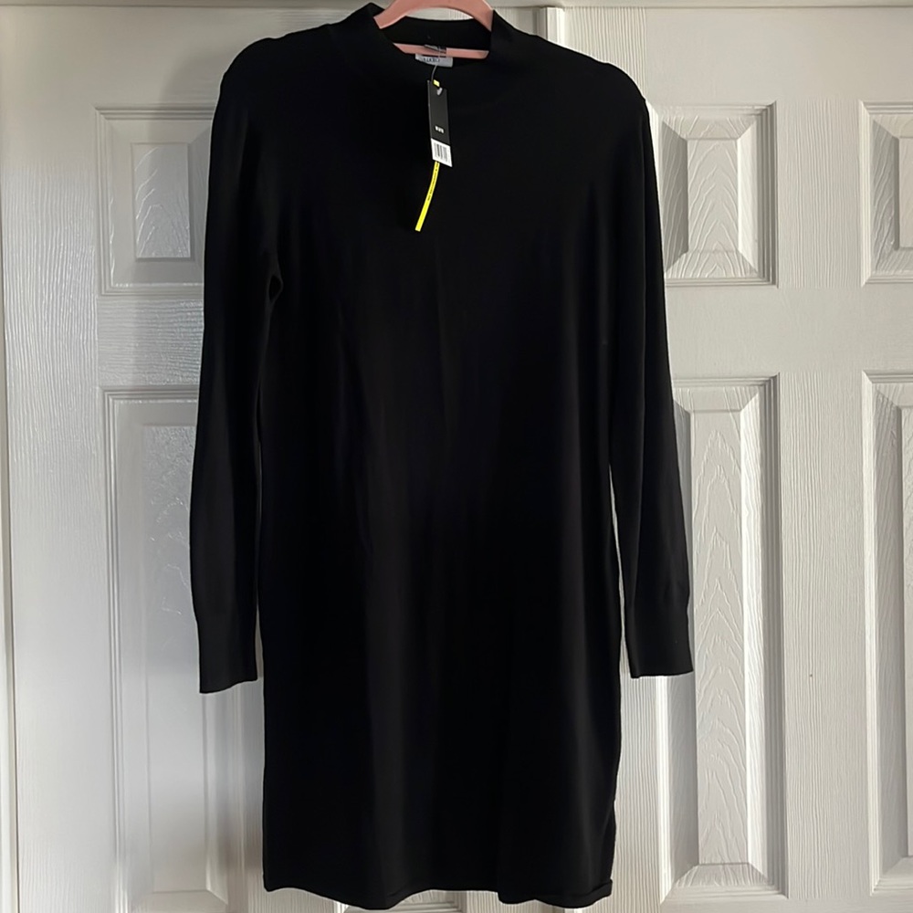 Black long sleeve sweater dress. M 8/10